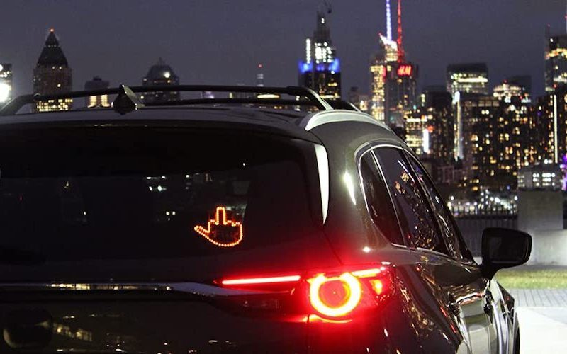 give the middle finger in the car